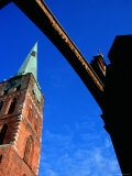 Spire of Jacobikirche Under Arch Spanning Engelsgrube, Lubeck, Schleswig-Holstein, Germany Photographic Print by Martin Lladó