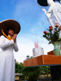 Woman Beseeches Quan Am, the Goddess of Mercy, My Tho, Tien Giang, Vietnam Photographic Print by Stu Smucker