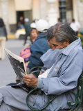 Man Reading Newspaper, Plaza de Armas, Peru Photographic Print by Brent Winebrenner