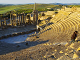 Person Walking Up Steps of Theatre, Dougga, Siliana, Tunisia Photographic Print by Bethune Carmichael