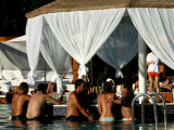 People in Swimming Pool Bar at Sunset Club in Palmerie, Marrakesh, Morocco Photographic Print by Doug McKinlay