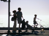Family Takes an Early Evening Stroll along Redondo Beach in Los Angeles, Los Angeles, California Photographic Print by Ray Laskowitz