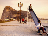 Playground at Bay of Algeciras with Rock of Gibraltar in Background, Andalucia, Spain Photographic Print by Witold Skrypczak