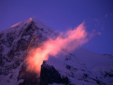 Eiger Mountain Looms in Purple Sunrise Light with Streaking Ridge Clouds, Bern, Switzerland Fotografisk trykk av Dominic Bonuccelli Eiger Mountain Looms in Purple Sunrise Light with Streaking Ridge Clouds, Bern, Switzerland Fotografisk trykk av Dominic Bonuccelli