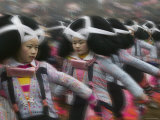 Long Horn Miao Girls in Traditional Costume Dancing at Flower Dance Festival, Guizhou, China Photographie par Keren Su