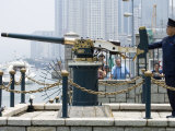 Man Shooting Noon-Day Gun, Hong Kong, China Photographic Print by Greg Elms
