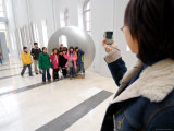 Woman Taking Group Photo Inside Seoul Museum of Art, Myong-Dong, Seoul, South Korea Photographic Print by Anthony Plummer