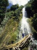 Person at Base of Mele Cascades Waterfall, Near Mele Maat, Efate Island, Shefa, Vanuatu Photographie par Holger Leue