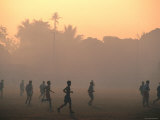 Children Playing Soccer at Sunset, Tha Khaek, Khammuan, Laos Lámina fotográfica por John Elk III