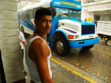 Man Waits for Bus in Torrential Tropical Downpour in Zona Centromexico Lámina fotográfica por Anthony Plummer Man Waits for Bus in Torrential Tropical Downpour in Zona Centromexico Lámina fotográfica por Anthony Plummer