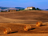 Field with Round Hay Bales, Val d'Orcia Valley, Tuscany, Italy Photographic Print by John Elk III