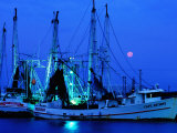 Moon over Shrimp Trawlers in Harbour, Palacios, Texas Photographie par Holger Leue