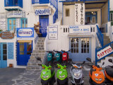 Motorbikes Parked Outside Shops Photographic Print by Diana Mayfield