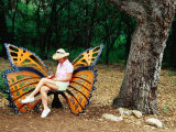 Woman Sitting in Butterfly Chair at Botanical Gardens, Zilker Park, Austin, Texas Photographic Print by Richard Cummins
