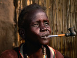 Woman Smoking a Pipe, Gambela, Ethiopia Photographie par Ariadne Van Zandbergen