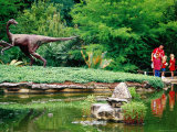 Children and Adult Standing near Ornithomimus Dinosaur Sculpture, Austin, Texas Photographic Print by Richard Cummins