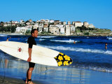 Surfer Carrying Surfboard on Bondi Beach, Sydney, New South Wales, Australia Photographic Print by Holger Leue