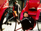 Rickshaw Puller at Star Ferry Pier, Hong Kong, China Photographic Print by Alain Evrard