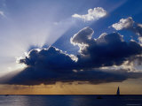 Sunset Shining through Clouds, Isla Cozumel, Quitana Roo, Mexico Photographic Print by Richard Cummins