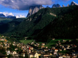 Ortisei Village and Peak of Sassolungo in Dolomites, Ortisei, Trentino-Alto-Adige, Italy Photographic Print by Glenn Van Der Knijff