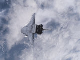 Space Shuttle Edeavour as Seen from the International Space Station, August 10, 2007 Lámina fotográfica por Stocktrek Images Space Shuttle Edeavour as Seen from the International Space Station, August 10, 2007 Lámina fotográfica por Stocktrek Images