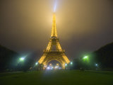 Eiffel Tower Illuminated in Fog and Rain at Night, Paris, France Photographic Print by Jim Zuckerman
