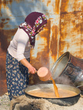 Turkish Women Cooking a Syrup, Cappadoccia, Turkey Photographie par Darrell Gulin