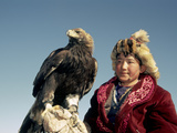 Youngest Eagle Hunter in the Festival, Talgat, Golden Eagle Festival, Mongolia Photographic Print by Amos Nachoum