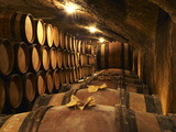 Wooden Barrels with Aging Wine in Cellar, Domaine E Guigal, Ampuis, Cote Rotie, Rhone, France Photographic Print by Per Karlsson