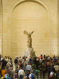 Interior of The Louvre Museum Showing Winged Victory Statue and Tourists, Paris, France Photographic Print by Jim Zuckerman