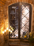 Wine Cellar with Bottles Behind Iron Bars, Stockholm, Sweden Photographic Print by Per Karlsson
