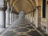 Columns and Archways Along Patterned Passageway at the Doge's Palace, Venice, Italy Photographic Print by Dennis Flaherty