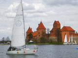 Sailboat with Island Castle by Lake Galve, Trakai, Lithuania Photographic Print by Keren Su