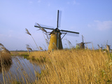 Windmills Along the Canal in Kinderdijk, Netherlands Photographic Print by Keren Su