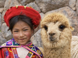 Girl in Native Dress with Baby Alpaca, Sacsayhuaman Inca Ruins, Cusco, Peru Fotografisk tryk af Dennis Kirkland Girl in Native Dress with Baby Alpaca, Sacsayhuaman Inca Ruins, Cusco, Peru Fotografisk tryk af Dennis Kirkland