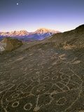 Circular Petroglyphs at the Edge of the Great Basin, Sierra Nevada Range in the Distance, Las Vegas Photographie par Dennis Flaherty