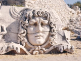 Carved Head of Medusa at the Archaeological Site of Didyma, Turkey Photographic Print by Richard Ashworth
