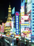 Blurred Neon Lights at Night, Nanjing Dong Lu New Pedestrian Street, Nanjing Road, Shanghai, China Photographic Print by Gavin Hellier