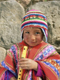 Portrait of a Peruvian Boy in a Knitted Hat, Playing the Flute, Near Cuzco, Peru, South America Photographic Print by Gavin Hellier