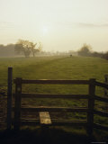 Stile and Marker Arrow on Footpath Along the River Severn, Gloucestershire, England Photographic Print by Jenny Pate