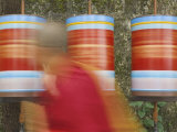Buddhist Monk Passing Prayer Wheels, Mcleod Ganj, Dharamsala, Himachal Pradesh State, India, Asia Photographic Print by Jochen Schlenker