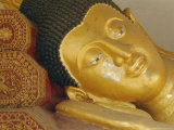 Close-up of Head of a Reclining Buddha Statue, Wat Chedi Luang, Chiang Mai, Thailand Photographic Print by Bruno Morandi
