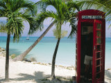 English Telephone Box on the Beach, Dickenson's Bay, North-East Coast, Antigua, West Indies Photographic Print by J P De Manne