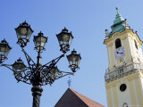 Tower of Old Town Hall and Wrought Iron 19th Century Street Lamp, Bratislava, Slovakia, Europe Photographie par Richard Nebesky