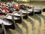 A Line of Gondolas, Venice, Veneto, Italy, Europe Photographic Print by Sergio Pitamitz