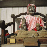 Buddhist Todai-Ji Temple, Image of Binzuru, Touching It is Supposed to Cure Illness, Nara, Japan Photographie par Christopher Rennie
