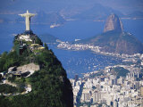 Statue of Christ the Redeemer Overlooking City and Sugar Loaf Mountain, South America Photographic Print by Marco Simoni