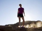 Woman Jogging, Monument Valley Navajo Tribal Park, Arizona Utah Border Photographie par Angelo Cavalli