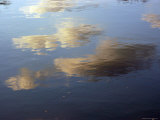 Clouds Are Reflected on a Glassy Surfaced Lake Photographic Print by Stacy Gold