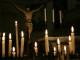 Candles and Saint Inside a Cathedral in Ravenna, Italy Photographic Print by Gina Martin